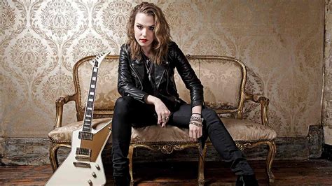 Behind the Stage: Revealing Lzzy Hale's Personal Life and Achievements