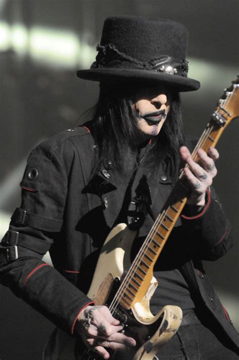 Mick Mars' Unique Guitar Style: From Licks to Solos
